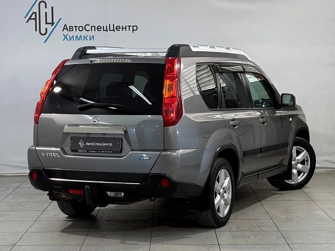 Nissan X-Trail 2010 2.0 CVT 4WD (141 л.с.) Серый 84310657 фото 2