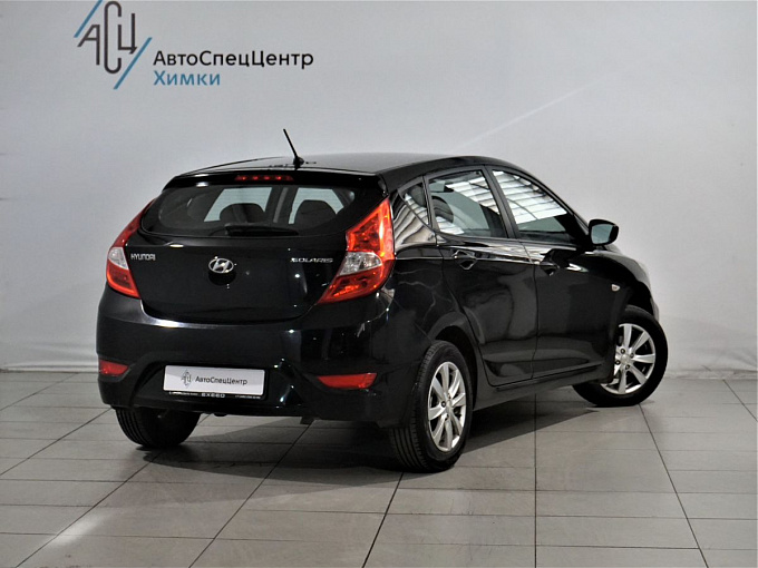 Hyundai Solaris 2012 1.4 MT (107 л.с.) Чёрный 60520131 фото 6