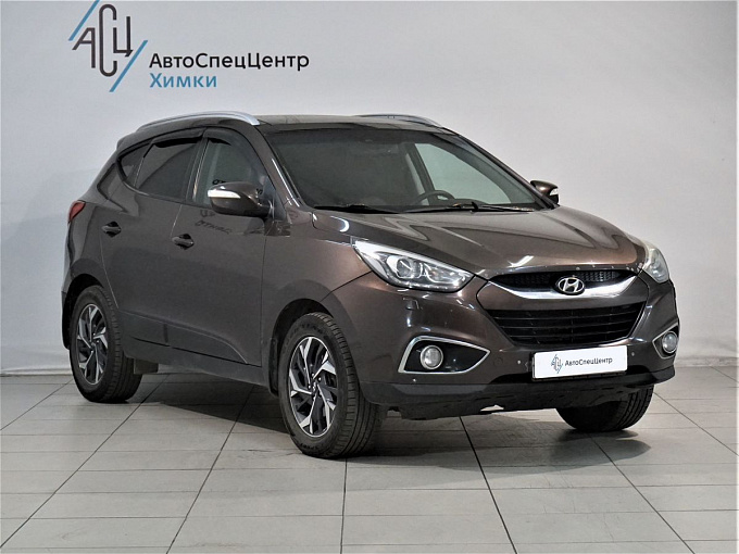 Hyundai ix35 2014 2.0 AT 4WD (150 л.с.) Коричневый 61459818 фото 2