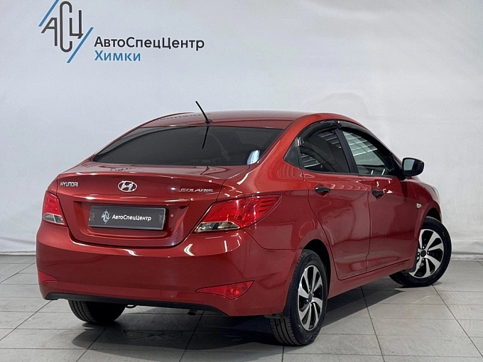 Hyundai Solaris 2014 1.4 AT (107 л.с.) Красный 84041014 фото 6