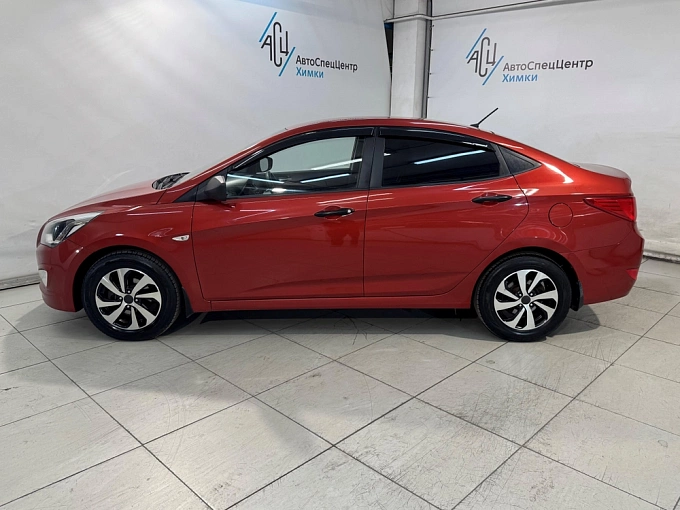 Hyundai Solaris 2014 1.4 AT (107 л.с.) Красный 84041014 фото 3
