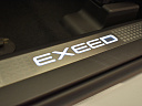 EXEED TXL Business 1.6 AMT 4WD (194 л.с.) Аструм (белый) фото 15